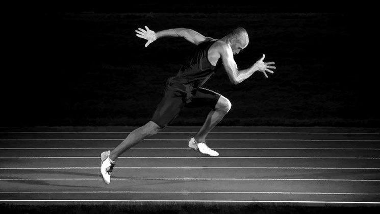 Track Athlete Sprinting at Maximum Velocity