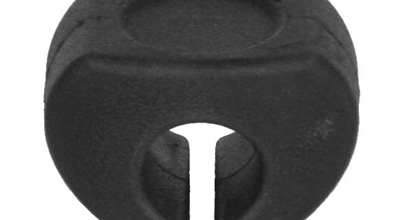 A black plastic clip with a rounded square shape and an open slit on one side. It appears to be designed for organizing or holding cables. The surface is smooth with a subtle texture.