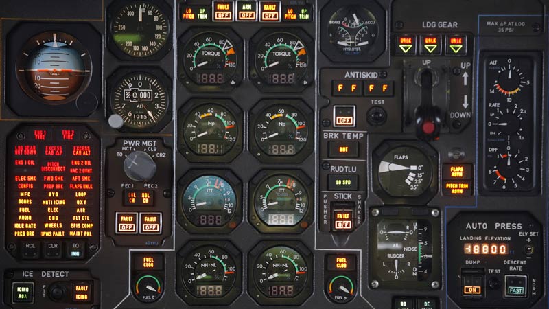 Cockpit control panel with various gauges, dials, and switches displaying flight information. Illuminated buttons and meters indicate different readings, including pressure, temperature, and altitude settings.