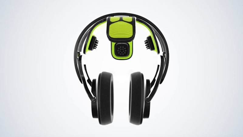 Overhead view of black and green headphones with thick ear cushions and a unique design on the headband. The headphones are set against a light background.